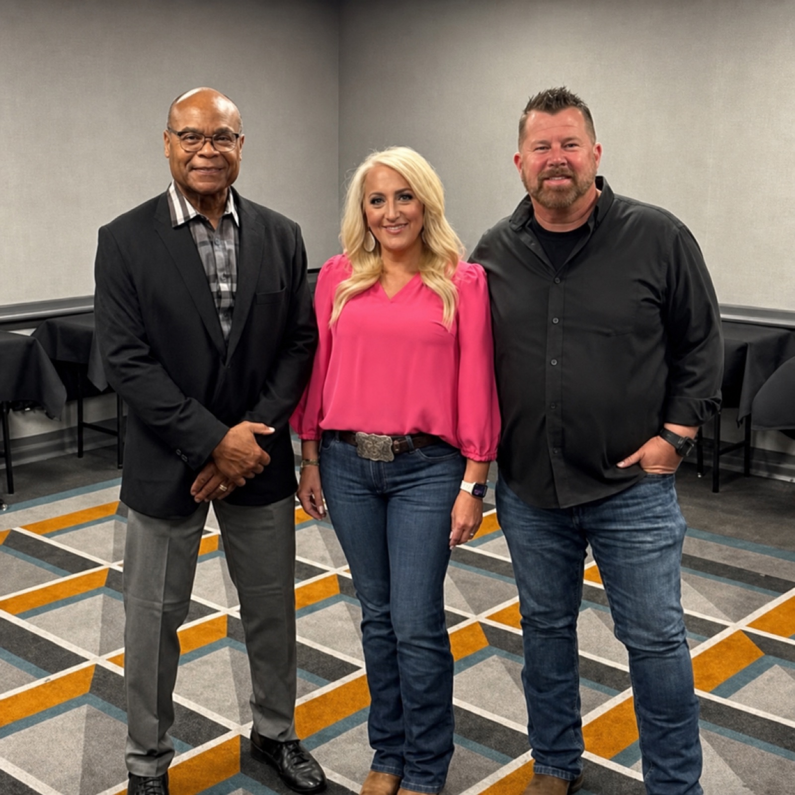 Eric and Jennifer Jones with a fellow professional at an industry event