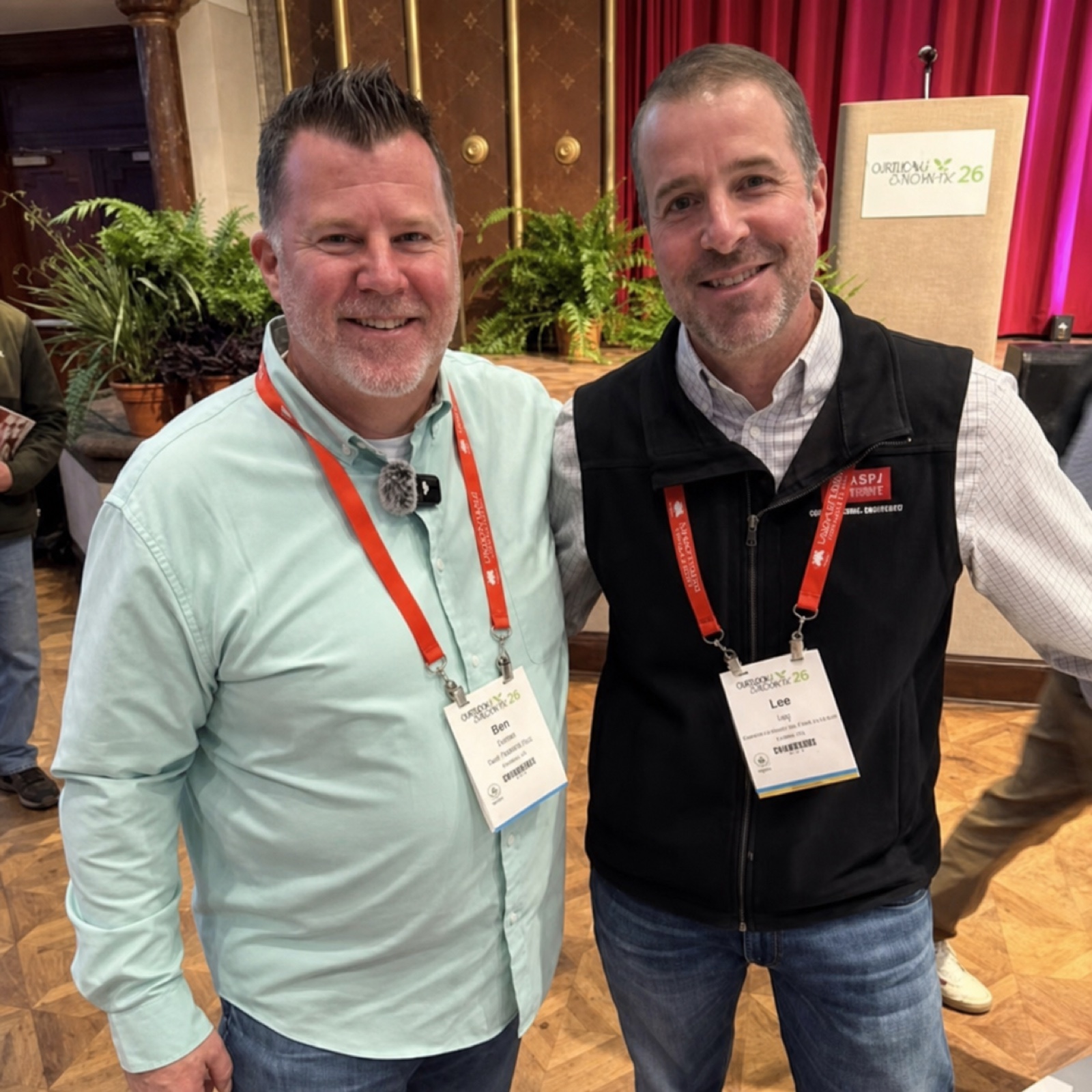 Eric Jones meeting a Green Industry professional at a trade show